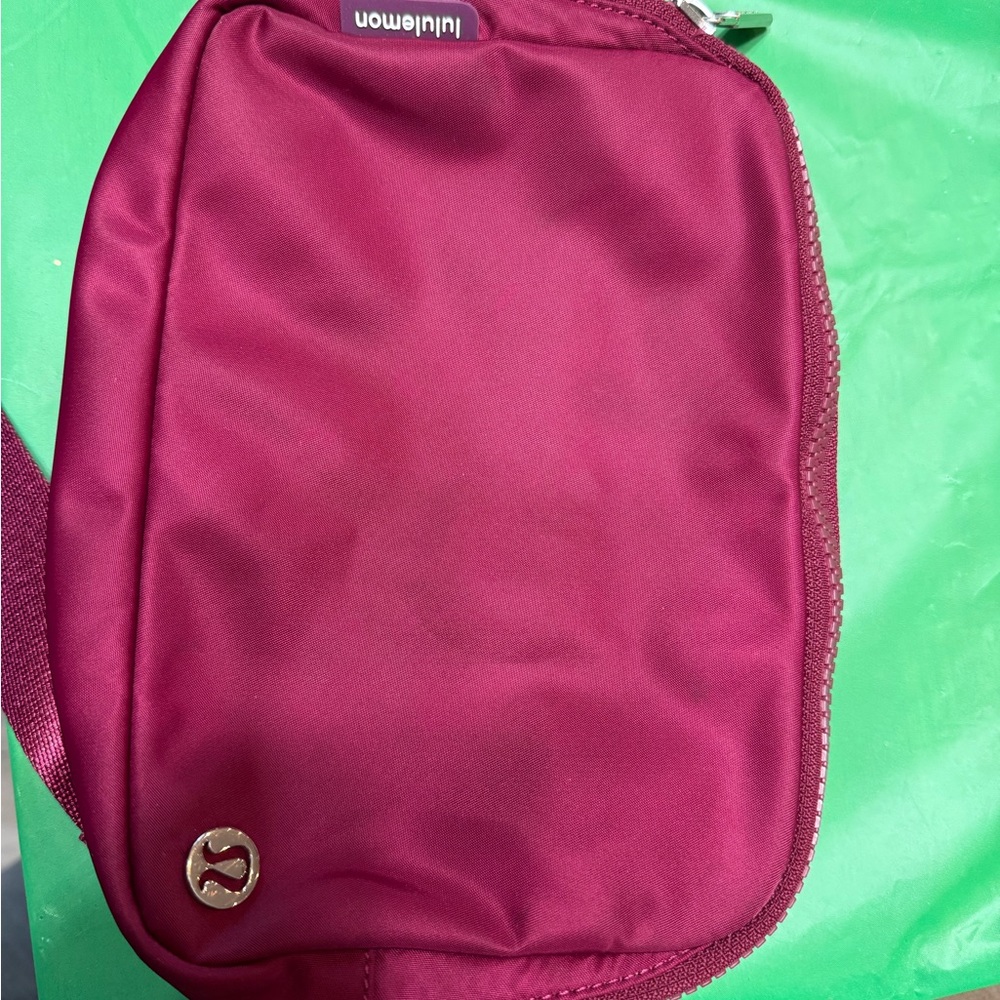 Lululemon Burgundy Belt Bag / Sling Bag Crossbody Adjustable Strap